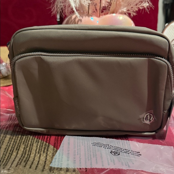 Lululemon Athletica Beige woman everywhere crossbody 3L metal hardware Bag